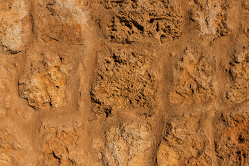 Ancient wall made of stones in the Egyptian desert, Sinai Peninsula. Background