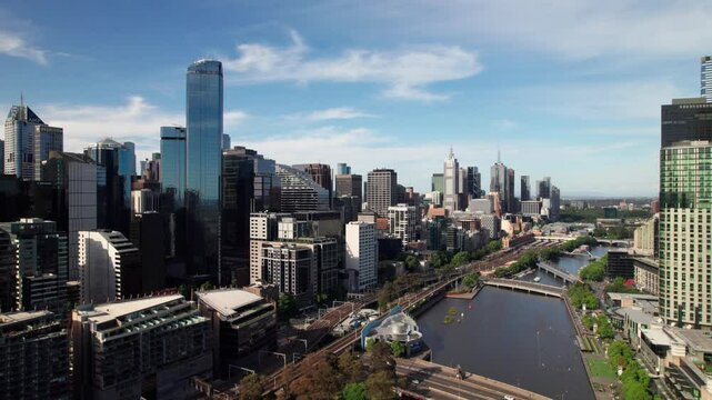 Long high aerial of Melbourne skyline in summer, 4K