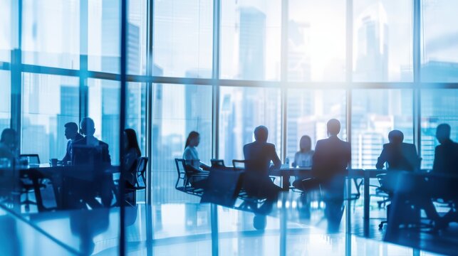 Silhouetted professionals gathered around a conference table in a glass-walled office, overlooking a cityscape. Cool blue tones and natural light create a calm, focused atmosphere