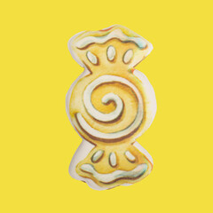 Homemade gingerbread colored cookie „Yellow candy“ on yellow, isolated Christmas handmade gingerbread cookie „Yellow candy“ on yellow background, Christmas dessert, top view, flat lay