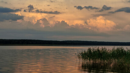 beautiful orange sunset on the lake in summer