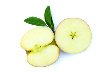 Cut of fresh apple with green leaves both cross section and lengthwise isolated on white background with clipping path stack