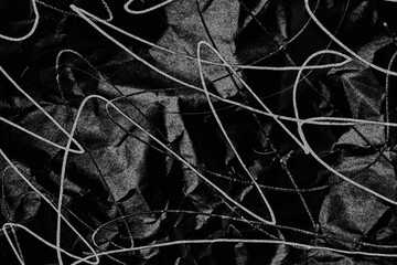 black crumpled paper background texture
