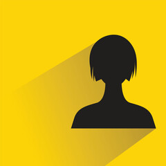 silhouette woman with shadow on yellow background