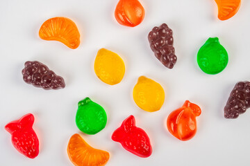 Assorted gummy candies, Juicy colorful jelly sweets. Gummy candies on white background