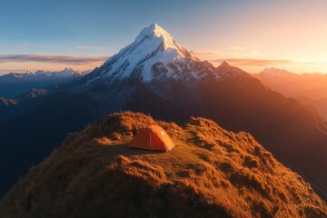 Naklejka premium Camping at sunset near a majestic mountain with snow-capped peak in a serene landscape