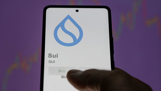 SUI $Sui on the screen of an exchange. SUI Sui price stocks, $SUI on a device.