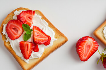 White sandwich with strawberries on . food sandwich snack concept. white plate with slices of toast, strawberries, and cream on a . a sandwich with strawberries, toasts, cream and a slice of on bread.