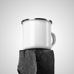 White enamel mug mockup on burnt wood, close-up, iron cup with silver rim on cup, place for design, print, branding.
