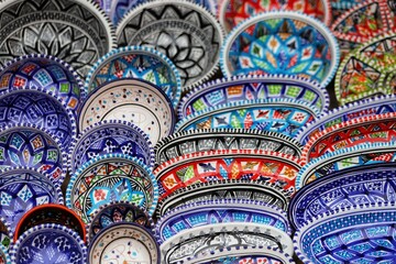Decorative ceramic Moroccan dishes, traditional clay crafts.