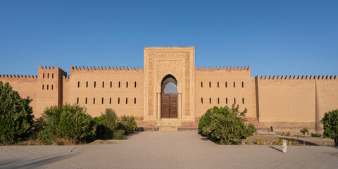 Scenic landscape view of Hulbuk or Khulbuk fortress wall and entrance gate in late afternoon, Vose, Khatlon, Tajikistan