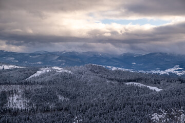 Dramatic Winter Landscape with Snow-Covered Hills