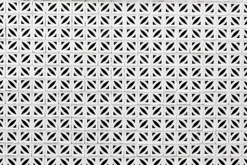 Concrete fence grate design. Grid mesh pattern wall