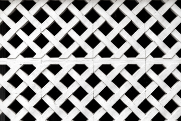 Concrete fence grate design. Grid mesh pattern wall