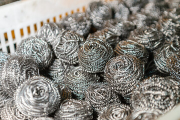 Metal cookware scraper on a white background. Universal metal scraper.