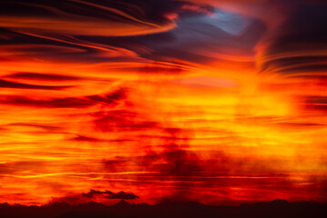 Lenticular clouds at sunset Amazing natural phenomena