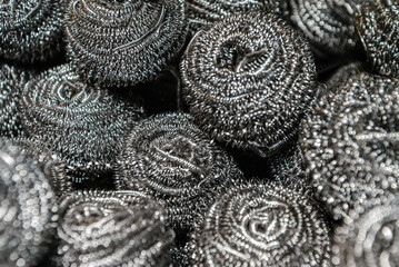 Metal cookware scraper on a white background. Universal metal scraper.