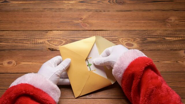 Santa Claus opening a 3D gift card with Christmas decorations stove