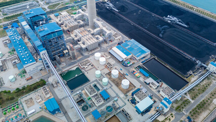 Heavy industrial coal power electricity plant with chimney and pipes, lignite coal product mass...