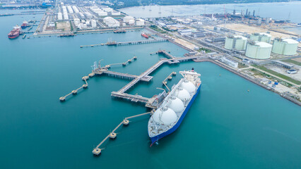 LNG (Liquified Natural Gas) tanker anchored in Gas terminal gas tanks for storage. Oil Crude Gas...