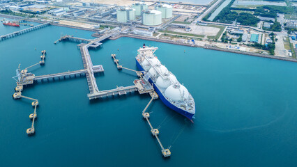 LNG (Liquified Natural Gas) tanker anchored in Gas terminal gas tanks for storage. Oil Crude Gas...