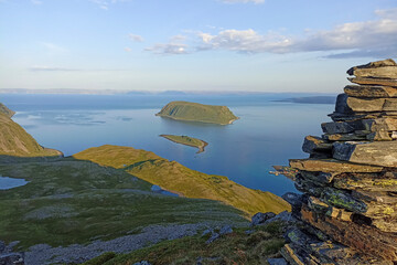 The scenery of nature in Sarnes on Mageroya Island, Norway, with a view of Store Altsula Island