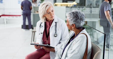 Doctor, advice and tablet with old woman in hospital for consulting, meeting and healthcare...
