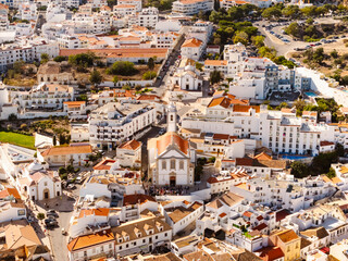 Fototapeta premium Aerial View of residential houses and Mother Church in Albufeira, Portugal