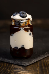 delicious blueberry-flavored yogurt in a glass jar