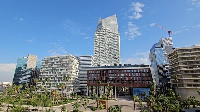 Casablanca, Morocco - November 18, 2024 : view of business buildings Finance City Anfa Park Tower or CFC Tower - the new finance district in Casablanca