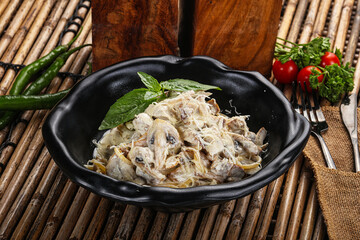 Italian pasta with chicken and mushrooms