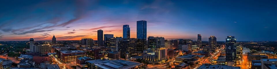 A vibrant cityscape of Illinois at dusk, showcasing the iconic landmark with high-rise buildings . The sky is painted with hues of blue and purple as the sun sets behind them, casting long shadows