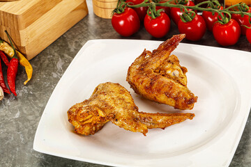 Tasty roasted chicken wing with spices