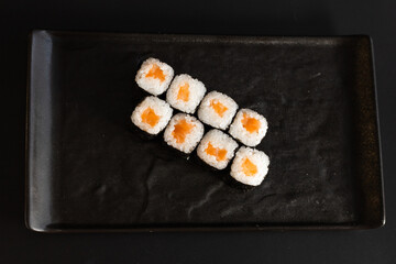 rolls on a black background