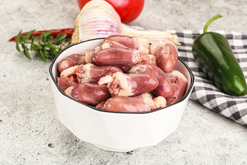 Fresh raw chicken hearts in the bowl
