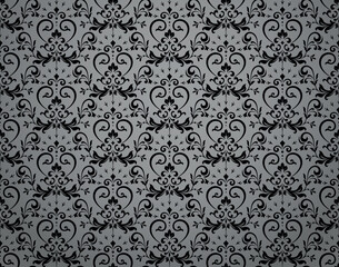 Floral pattern. Vintage wallpaper in the Baroque style. Seamless vector background. Gray and black ornament for fabric, wallpaper, packaging. Ornate Damask flower ornament