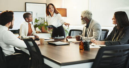 Business people, tablet and meeting with analytics for finance, company performance or report at office. Group, employees or coaching with technology for presentation, revenue or profit at workplace