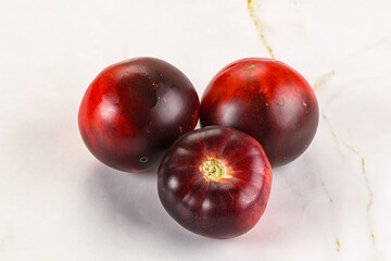 Black ripe juicy organic tomato