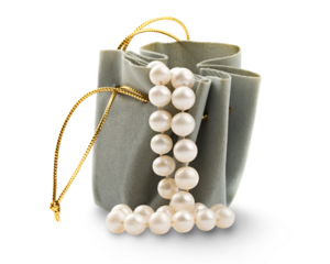 Gift box and pearl isolated on white
