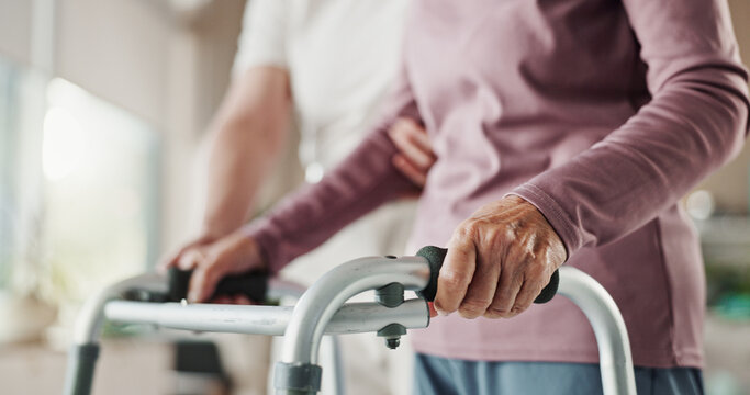 Walker, physiotherapy and hands of old person in office for healthcare, osteoporosis or rehabilitation. Medical, helping and support with closeup of senior patient and doctor for healing and walking