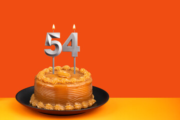Birthday candle number 54 - Cake with dulce de leche frosting.