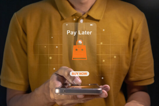 Man using a smartphone for online shopping with payment later. Buy now pay later online shopping concept.