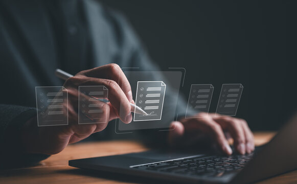 Electronic signature, paperless for office concept, Businessman sign electronic documents in a digital files on virtual screen. E-signing, Smart document management. Online documentation database.