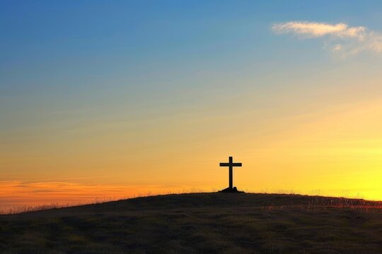 A jesus cross backlighting outdoors horizon.