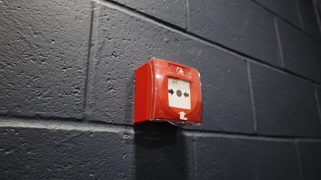 Red Fire Alarm Wall Button Close-Up