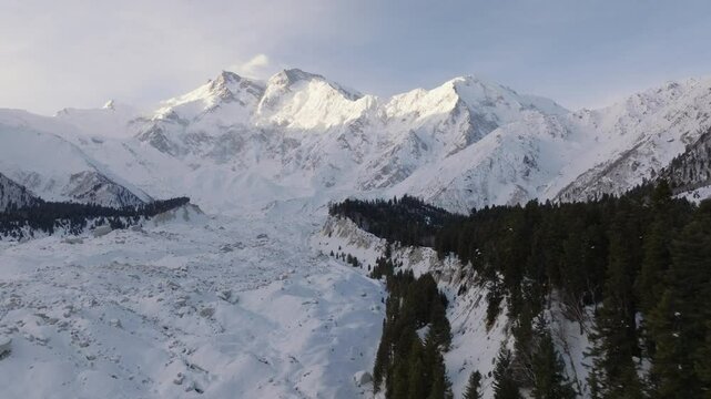 Snowy Nanga Parbat at Winter. Aerial Drone Shot with a glacier in valley, Fairy Meadows Pakistan, Mount Killer at Dawn