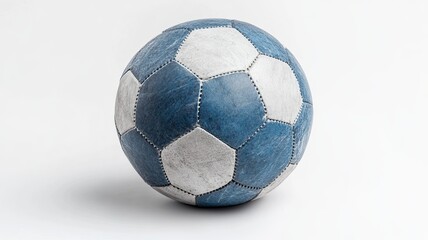 Naklejka premium Worn Soccer Ball: A nostalgic view of a well-loved, vintage soccer ball, showing signs of wear and tear, evoking memories of countless games and adventures.