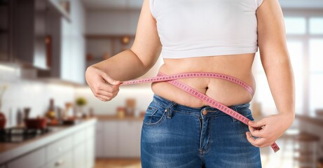 Obese Woman upset touching fat belly