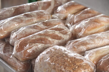 close up baguette in plastic