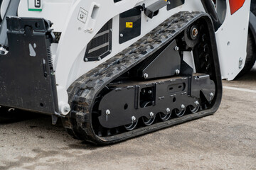 Compact track loader skid tracks new condition in black color on white loader industrial machinery